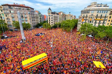 BARCELONA, SPAIN - SEPTEMBER 11, 2018: Hundreds of thousands of Catalans call for independence from Spain on the National Day of Catalonia. clipart