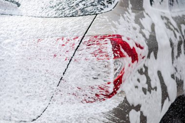 Sabunla yıkama araba. Kavram kapatın.