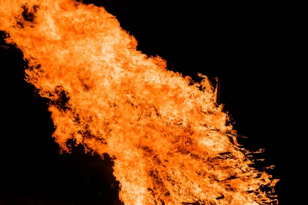Blaze fire flame In dark background — Stock Photo, Image