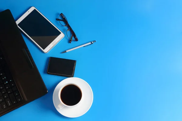 Tablet Laptop Pen Glasses Cup Black Coffee Saucer Blue Background — Stock Photo, Image