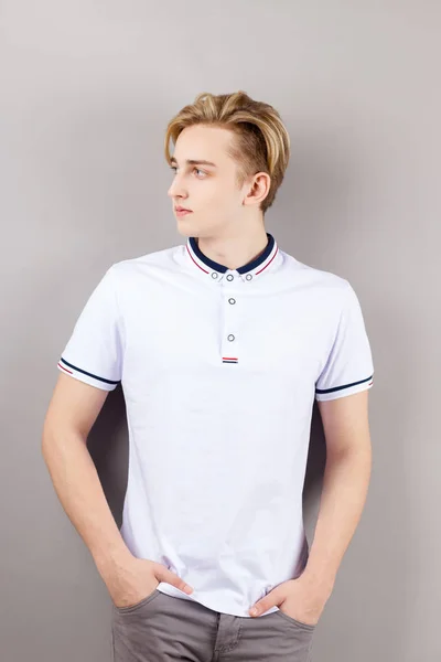 Handsome Boy Teenager White Shirt Stands Hands Pockets Looks Away — Stock Photo, Image