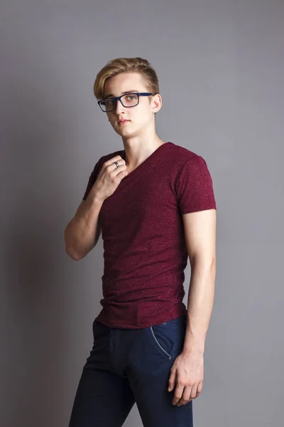 Handsome Boy Teenager Glasses Stands Wall Grey Studio — Stock Photo, Image