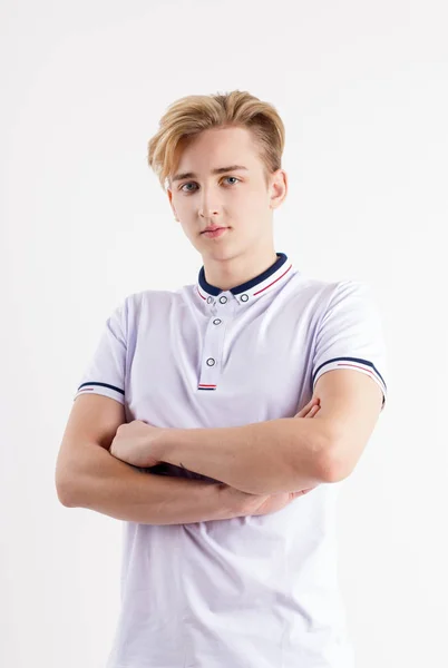 Handsome Boy Teenager White Shirt Stands Crossed Arms White Studio — Stock Photo, Image