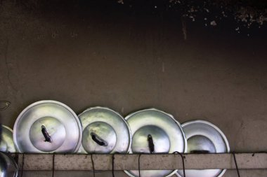 Eski tencere kapağı duvara asılmiyordu. Tayland, Asya