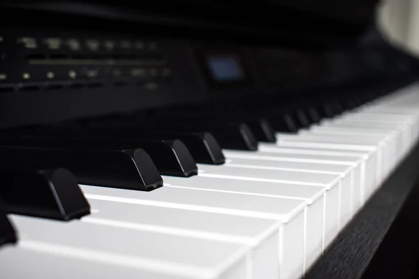 Close-up of piano keys. The black piano was set up in the music — Stock Photo, Image