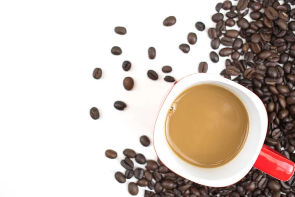 A cup of coffee placed on the coffee bean On a white background