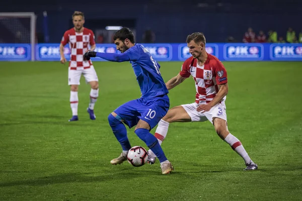 Zagreb, Hırvatistan - 21 Mart 2019: Uefa Euro 2020 Ön eleme turu. Hırvatistan Azerbaycan 'a karşı. Mahir Madatov (10) ve Borna Barisiç (3))