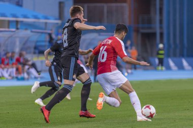 ZAGREB, CROATIA - JULY 24, 2018: UEFA Champions League match between GNK Dinamo Zagreb and Hapoel Beer-Sheva FC (5-0). Oren BITTON (16) and Izet HAJROVIC (8)
