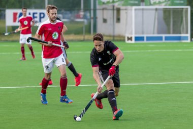 Zagreb, Hırvatistan - 26 Haziran 2018: Hırvatistan 2018 'de Hokey Serisi açıldı. Avusturya ile Galler arasında maç (3-0). Saha Hokeyi oyuncuları iş başında