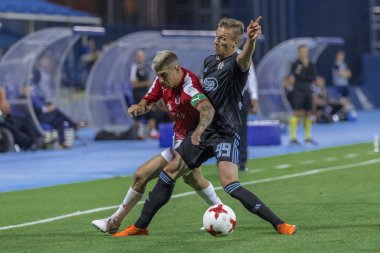 ZAGREB, CROATIA - JULY 24, 2018: UEFA Champions League match between GNK Dinamo Zagreb and Hapoel Beer-Sheva FC (5-0). In action Maor MELIKSON (24) and Mislav ORSIC (99)