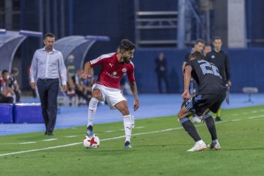 ZAGREB, CROATIA - JULY 24, 2018: UEFA Champions League match between GNK Dinamo Zagreb and Hapoel Beer-Sheva FC (5-0). In action Ben BITTON (2) and Marin LEOVAC (22)