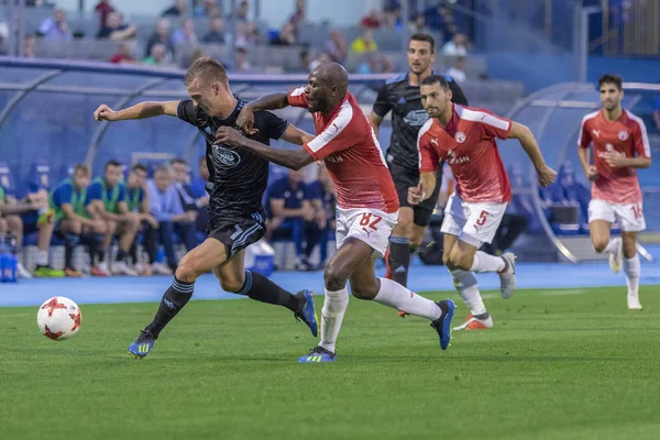 ZAGREB, CROATIA - JULY 24, 2018: UEFA Champions League match between GNK Dinamo Zagreb and Hapoel Beer-Sheva FC (5-0). In action Dani OLMO (7) and Julien CETOUT (82)