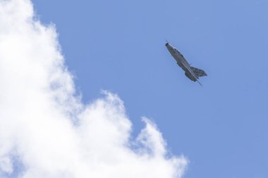 VELIKA GORICA, CROATIA - MAY 19, 2018: AirVG 2018 Airshow. MIG 21 fighter jet in flyby during AirVG 2018 Airshow. clipart