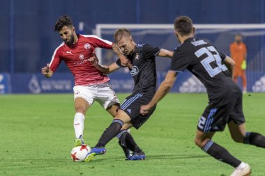 ZAGREB, CROATIA - JULY 24, 2018: UEFA Champions League match between GNK Dinamo Zagreb and Hapoel Beer-Sheva FC (5-0). In action Dani OLMO (7) and Ben BITTON (2)