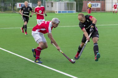 Zagreb, Hırvatistan - 26 Haziran 2018: Hırvatistan 2018 'de Hokey Serisi açıldı. Avusturya ile Galler arasında maç (3-0). Saha Hokeyi oyuncuları iş başında