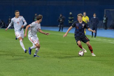 ZAGREB, CROATIA - NOVEMBER 15, 2018: UEFA Nations League football match Croatia vs. Spain. In action Tin Jedvaj (16) and Sergi Roberto (20)