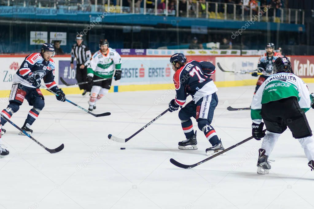ZAGREB, CROATIA - SEPTEMBER 22, 2017: EBEL ice hockey league match between Medvescak Zagreb and  Graz 99ers. Tomas NETIK (71) with puck