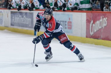 ZAGREB, CROATIA - SEPTEMBER 22, 2017: EBEL ice hockey league match between Medvescak Zagreb and  Graz 99ers.Mario PUSKARICH (21) with puck 