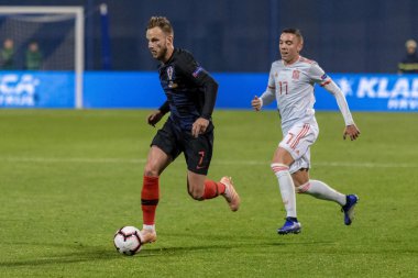ZAGREB, CROATIA - NOVEMBER 15, 2018: UEFA Nations League football match Croatia vs. Spain. In action Ivan Rakitic (7) and Iago Aspas (17)