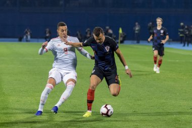 ZAGREB, CROATIA - NOVEMBER 15, 2018: UEFA Nations League football match Croatia vs. Spain. In action Ivan Perisic (4) and Rodrigo (9)