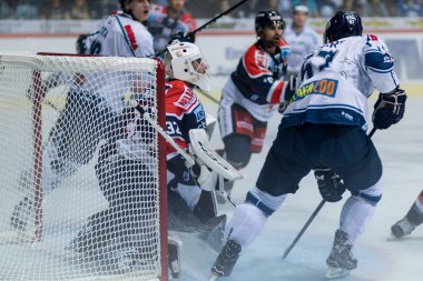 ZAGREB, CROATIA - SEPTEMBER 10, 2017: EBEL ice hockey league match between Medvescak Zagreb and Fehervar AV19. Players in action near goalie Gasper KROSELJ (32)