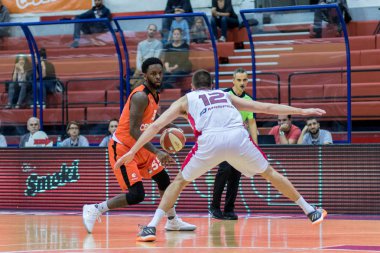 ZAGREB, CROATIA - SEPTEMBER 29, 2017: ABA league KK Cedevita Zagreb vs. KK FMP Beograd. Kevin Murphy (55) and Aleksandar Bursac (12)  in actio