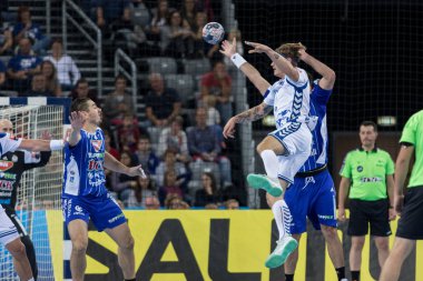 ZAGREB, CROATIA - SEPTEMBER 23, 2017: EHF Velux Champions League PPD Zagreb VS RK Pick Szeged. VUGLAC Mario (74) in air
