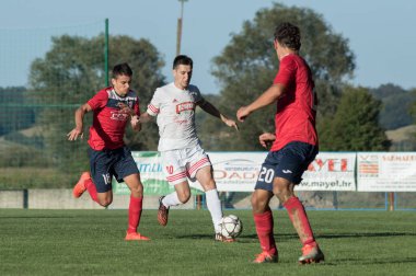 ZELINA, CROATIA - AUGUST 28, 2017:  Croatian Fourth Football League game between NK Croatia and NK Zelina. Unknown football players in action