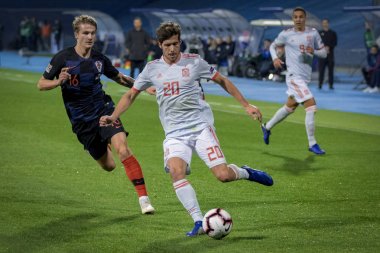 ZAGREB, CROATIA - NOVEMBER 15, 2018: UEFA Nations League football match Croatia vs. Spain. In action Tin Jedvaj (16) and Sergi Roberto (20)