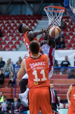 ZAGREB, CROATIA - SEPTEMBER 29, 2017: ABA league KK Cedevita Zagreb vs. KK FMP Beograd. Will Cherry (22) blocked by Michael Ojo (50