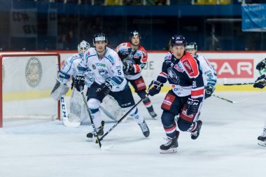 ZAGREB, CROATIA - SEPTEMBER 10, 2017: EBEL ice hockey league match between Medvescak Zagreb and Fehervar AV19. Saso RAJSAR (81) and Bence STIPSICZ (5) in action