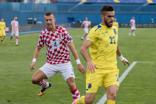 ZAGREB, CROATIA - SEPTEMBER 03, 2017: European qualifier for 2018 FIFA World CUp Russia. Croatia vs Kosovo. Ivan PERISIC (4) and Bajram Jashanica (22)