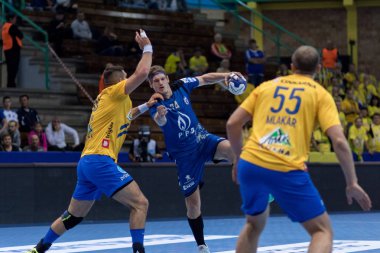ZAGREB, CROATIA - SEPTEMBER 19, 2017: SEHA League PPD Zagreb VS RK Celje Pivovarna Lasko. VUGLAC Mario (74) with the ball
