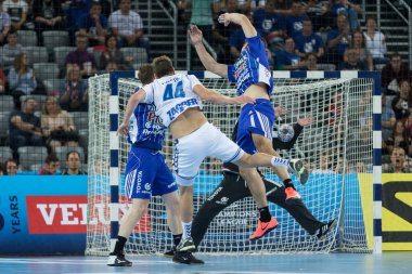 ZAGREB, CROATIA - SEPTEMBER 23, 2017: EHF Velux Champions League PPD Zagreb VS RK Pick Szeged. HRSTIC Matej (44) shoots at the goal, ball in the air