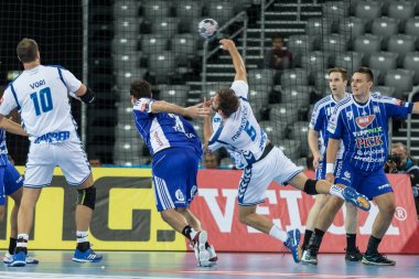 ZAGREB, CROATIA - SEPTEMBER 23, 2017: EHF Velux Champions League PPD Zagreb VS RK Pick Szeged. MRAKOVCIC Luka (5) shooting at the goal