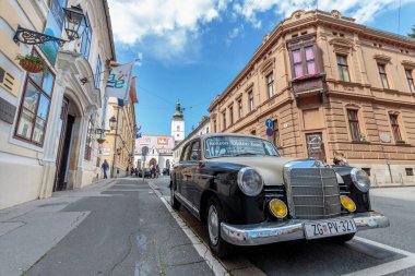 ZAGREB, CROATIA - MAY 07, 2016: Old two tone Mercedes from 60s parked on St. Mark's Square in Zagreb