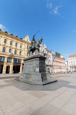 ZAGREB, CROATIA - MAY 07, 2016: Ban Jelacic monument on central city square (Trg bana Jelacica) in Zagreb, Croatia. The oldest standing building here was built in 1827
