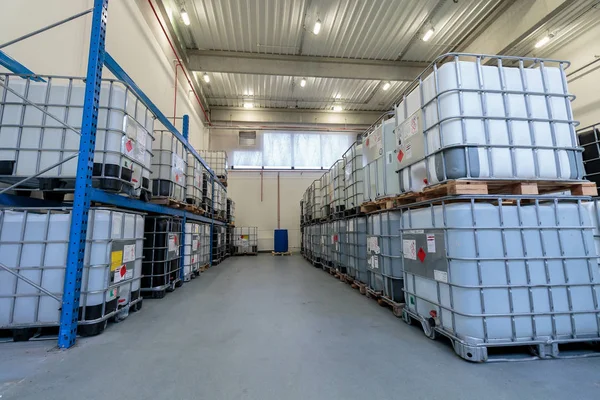 ZAGREB, CROATIA - DECEMBER 21, 2016: Warehouse with chemicals in IBC containers. IBC is used for storage and transport of chemicals.