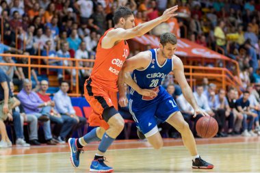 ZAGREB, CROATIA - MAY 28, 2017: Fourth game of finals of Croatian Basketball championship Cedevita vs. Cibona Zagreb. ROZIC Marin (20) running with ball 