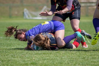 ZAGREB, CROATIA - MAY 6, 2017: Zagreb 7's - Rugby Tournament. Rugby players fight for ball