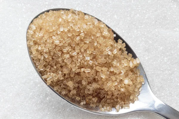 Brown Sugar Spoon White Sugar Background — Stock Photo, Image