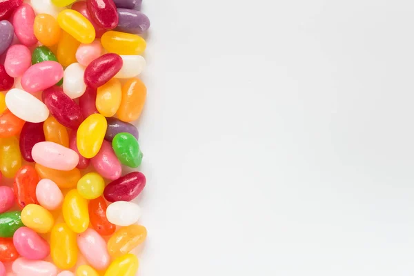 Jelly Beans Vit Bakgrund Kopiera Utrymme — Stockfoto