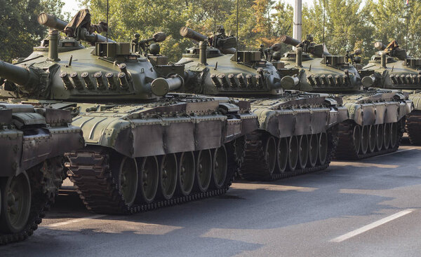 Military tanks M-84 on road