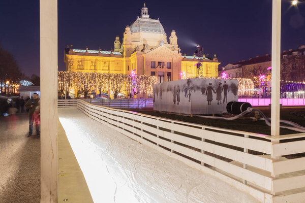 ZAGREB, CROATIA - DECEMBER 27, 2015: Advent in Zagreb, Ice Park, Art pavilion and Christmas stands on King Tomislav park