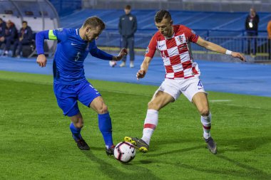 Zagreb, Hırvatistan-21 Mart 2019: UEFA Euro 2020 eleme turu. Hırvatistan vs Azerbaycan. Eylem Ivan Perisiç (4) ve Maksim Medvedev (5)