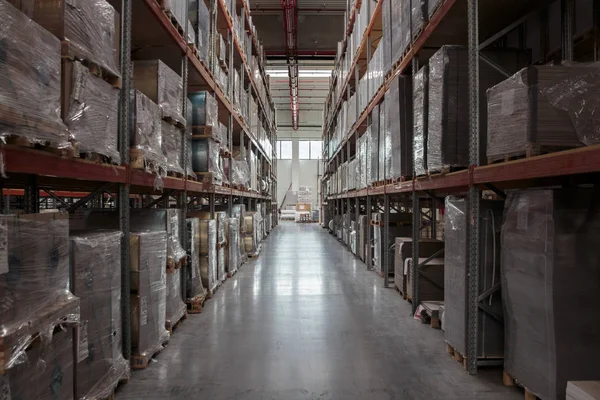 ZAGREB, CROATIA - SEPTEMBER 16, 2014: Printing house storage of goods in a modern warehouse. Large presses have a need for a continuous supply of materials needed for printing