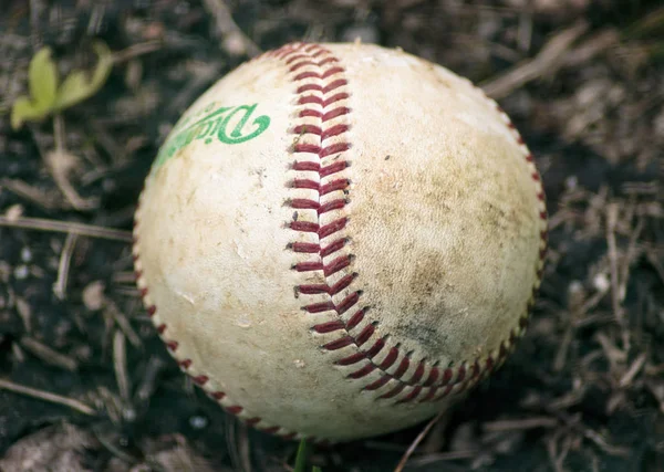 ZAGREB. CROATIA - OCTOBER 04, 2014: Baseball match Baseball Club Zagreb in white jersey and Baseball Club Karlovac in grey jersey. Ball left on the ground during the game