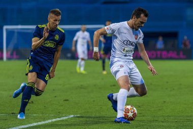 Zagreb, Hırvatistan - 30 Temmuz 2019: Uefa Şampiyonlar Ligi ikinci ön eleme turu, Gnk Dinamo vs. F.C. Saburtalo. Eylem Levan Kakubava (21) ve Mislav Orsic (99))
