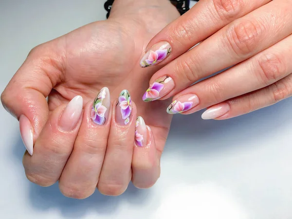 sample of nail design on female hands.