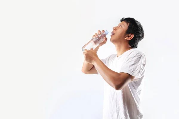 man drinking bottle isolated. man drink bottle of water